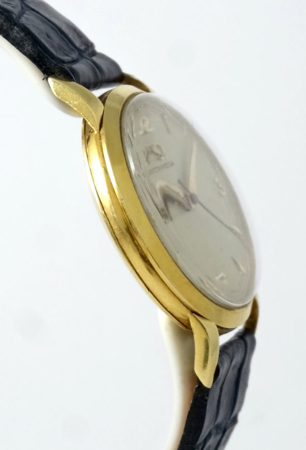 Omega nid d'abeille or jaune 36mm Circa 1952